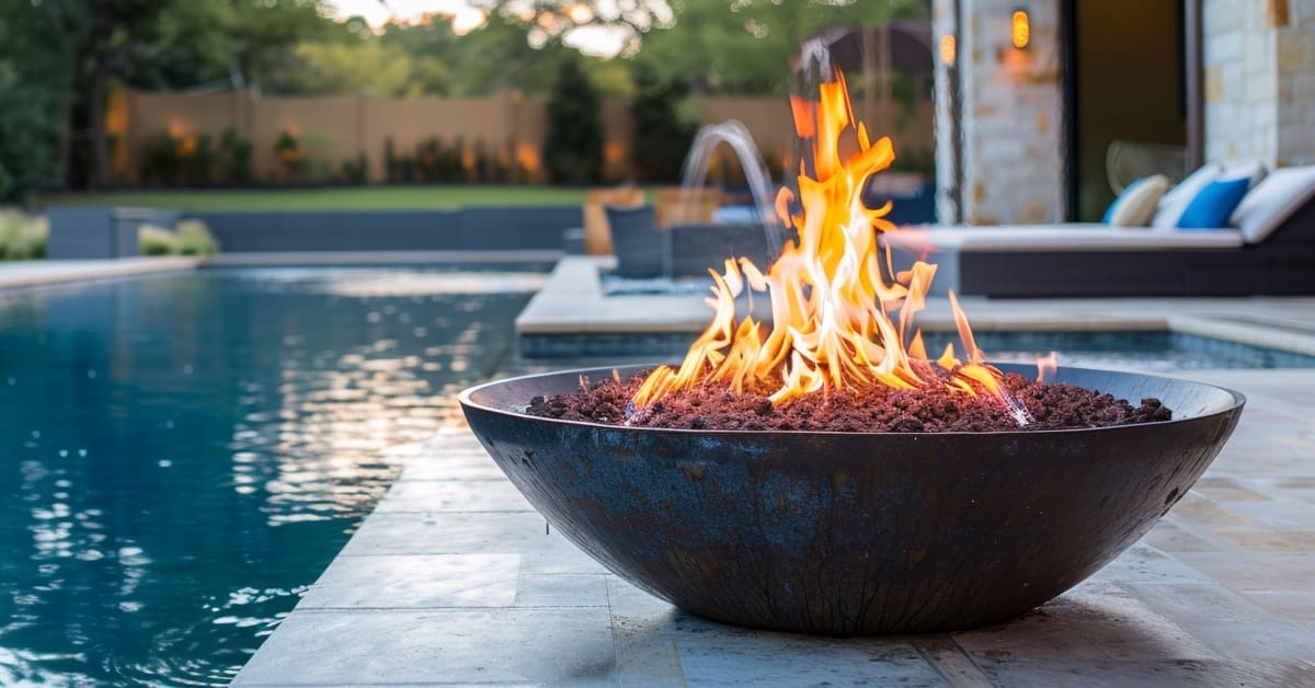 fire bowl next to pool